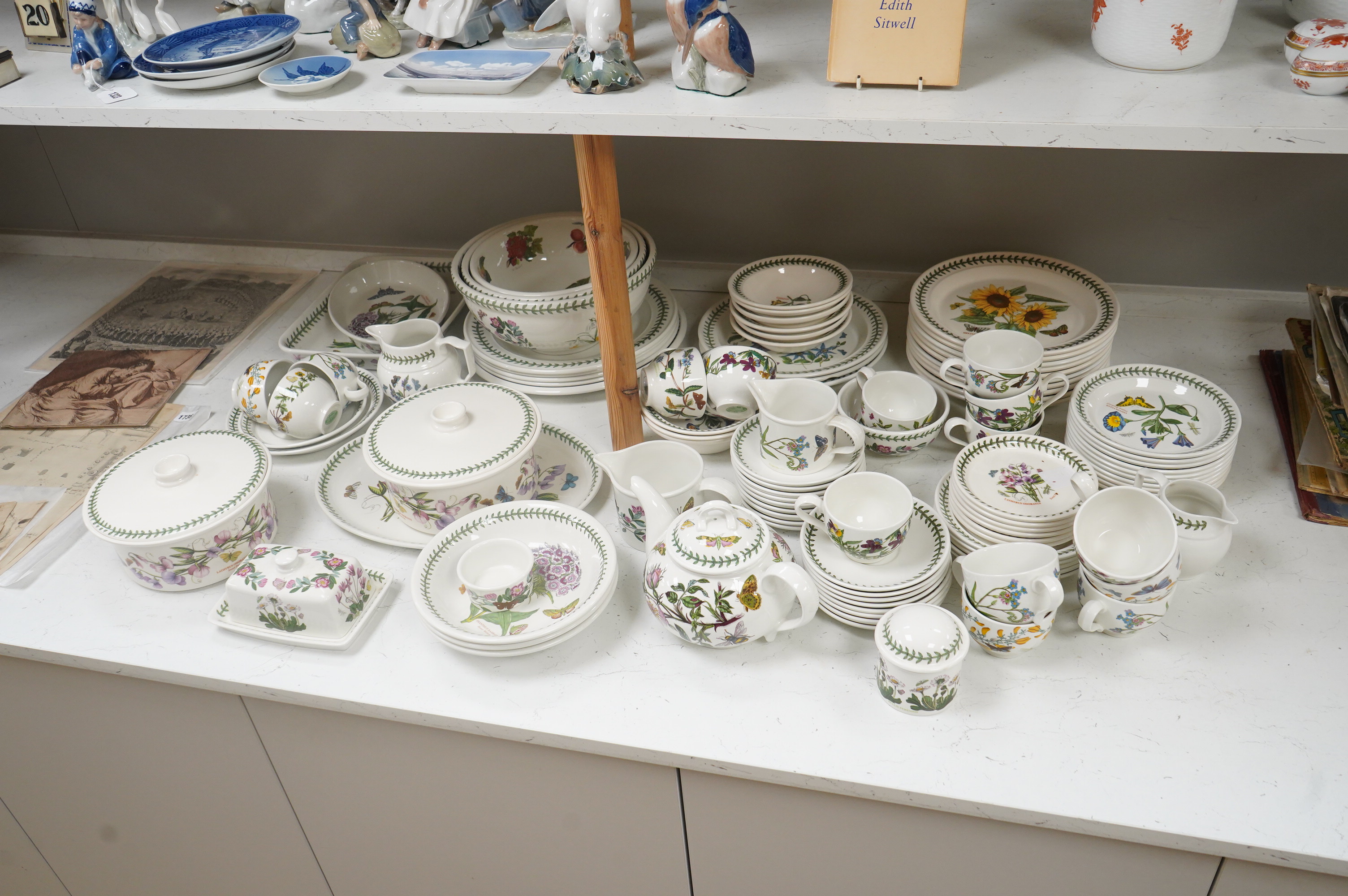 A large quantity of Portmerion Botanic Garden dinner and tea wares to include graduated bowls, dinner plates and side plates